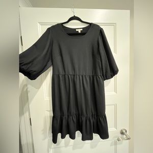 Women’s puff sleeve dress.